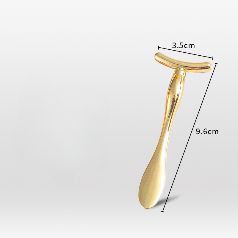t-bar massager in gold showing dimensions